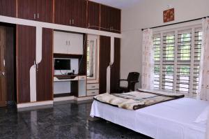 Ένα ή περισσότερα κρεβάτια σε δωμάτιο στο Blisss