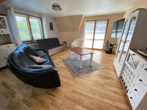 Posezení v ubytování Apartamenty u Basi