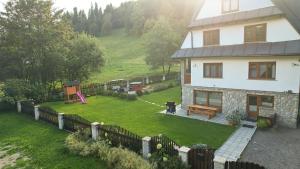 Zahrada ubytování Apartamenty u Basi + 13 fotografií