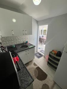 a kitchen with a sink and a counter top at Tourist pansiyon 1 in Antalya