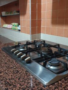 Kuchyň nebo kuchyňský kout v ubytování Appartement meublé Centre de Témara