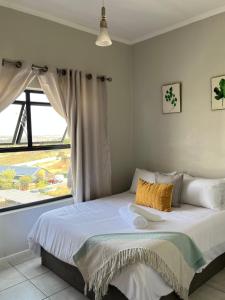 Postel nebo postele na pokoji v ubytování Zane's Haven, A home away from home