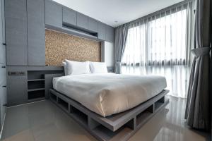 Ένα ή περισσότερα κρεβάτια σε δωμάτιο στο Luxury 2BR Condo Pool Rooftop Bar D6023 +46 φωτογραφίες