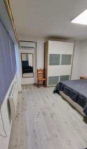 Μια τηλεόραση ή/και κέντρο ψυχαγωγίας στο Disfruta en familia junto al mar +46 φωτογραφίες