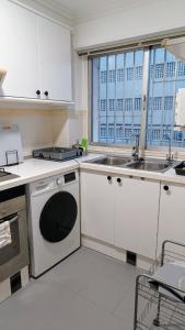 Η κουζίνα ή μικρή κουζίνα στο Disfruta en familia junto al mar