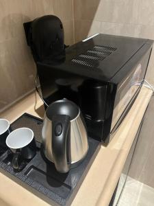 Kemudahan buat kopi dan teh di Apartment with self check-in 52