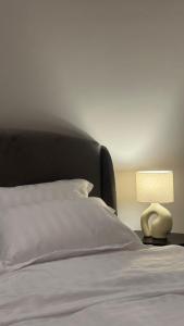 Katil atau katil-katil dalam bilik di Apartment with self check-in 52