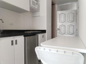 Kuchyň nebo kuchyňský kout v ubytování Apartahotel Barú - Usaquén