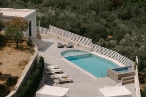 Πισίνα στο ή κοντά στο Olivia Villa, Celestial haven of luxury, By ThinkVilla