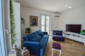 TV a/nebo společenská místnost v ubytování 60 passi dal mare-Charming CdO