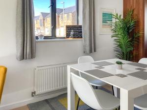 Φωτογραφία από το άλμπουμ του 3 Waterwheel Apartment σε Charlestown