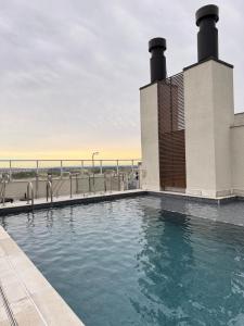 Πισίνα στο ή κοντά στο Conforto e praticidade em Canoas, AP novo, moderno e excelente localização