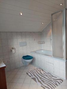 Koupelna v ubytování Häuschen Kunterbunt + 8 fotografií