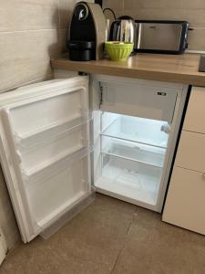 Dapur atau dapur kecil di Studio tout confort proche centre et Lac avec 2 vélos prêtés +7 gambar