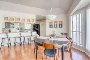 a kitchen and dining room with a table and chairs at Bike & Hike Retreat - Pet-Friendly with Fire Pit in Dug Hill