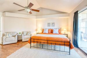 a bedroom with a bed and a ceiling fan at Bike & Hike Retreat - Pet-Friendly with Fire Pit in Dug Hill