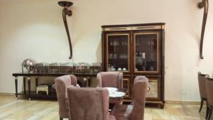 Χώρος καθιστικού στο Reina Villa Hotel