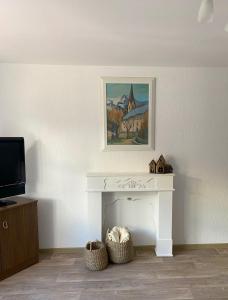 Et tv og/eller underholdning på Auszeit Ferienhaus Nr 2 + 13 billeder