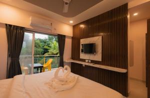 TV a/nebo společenská místnost v ubytování Shreem Resort