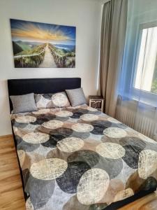 Ένα ή περισσότερα κρεβάτια σε δωμάτιο στο 2,5 Zimmer Apartment mit Balkon +2 φωτογραφίες