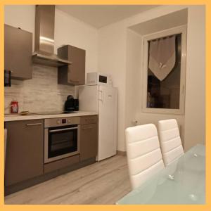 Η κουζίνα ή μικρή κουζίνα στο Le Charme du Léman I T2 I centre ville