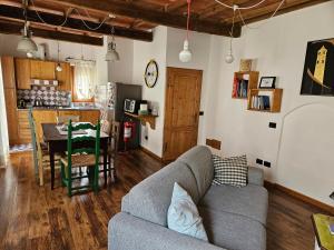 a living room with a couch and a table at Casetta in Centro in Città di Castello
