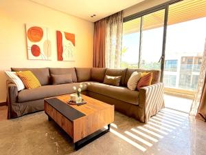 a living room with a couch and a coffee table at Casa Tina in Casablanca +30 photos