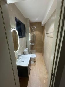 Koupelna v ubytování Appartement élégant, idéal famille ou affaires