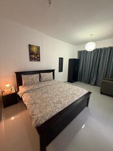 Ένα ή περισσότερα κρεβάτια σε δωμάτιο στο Emira Haven