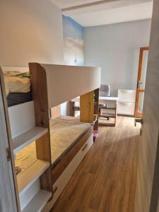 a room with a bunk bed and a desk at Sunset House in Costa Paradiso +17 photos