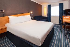 Voodi või voodid majutusasutuse Holiday Inn Express London Chingford by IHG toas +24 fotot