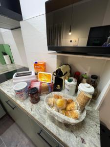 a kitchen counter with a bowl of food on it at Las Arcas, cómodo apartamento cerca del centro in Valladolid