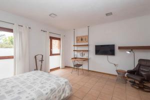 Μια τηλεόραση ή/και κέντρο ψυχαγωγίας στο Naranjo House en pleno centro Telde