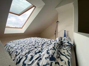 Postel nebo postele na pokoji v ubytování Scheunen-Loft am Gelbachtal