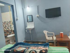 Ванная комната в Anugrah Homestay +141 фотография
