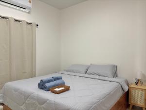 Katil atau katil-katil dalam bilik di MJ Home เอ็มเจ โฮม