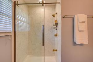 a bathroom with a shower with a glass door at 5 Mi to Lake Thom-A-Lex Pet-Friendly Retreat in Thomasville +18 photos