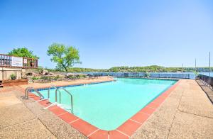 a large swimming pool on top of a building at Boat Slip and Pool Access at Lake Ozark Condo! in Lake Ozark