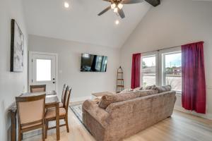 a living room with a couch and a table at Brand-New Home 2 Mi to Shannon Med Center! in San Angelo