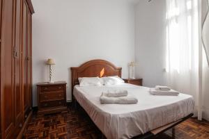 En eller flere senge i et værelse på Alojamiento acogedor