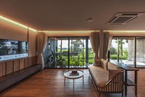 Posezení v ubytování Sataa Resort Nan