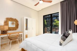 Ένα ή περισσότερα κρεβάτια σε δωμάτιο στο Amira District