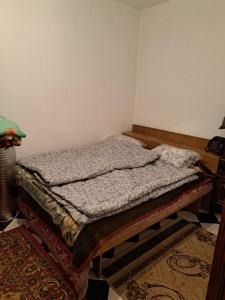 Tash-TyubeにあるДача Байтикのベッド1台 +17枚の写真