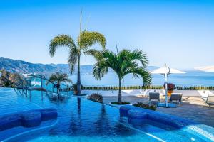 Bazén v ubytování Grand Miramar A302 nebo v jeho okolí