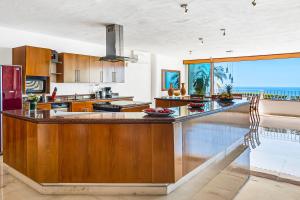 Kuchyň nebo kuchyňský kout v ubytování Grand Miramar APH1