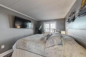 Ένα ή περισσότερα κρεβάτια σε δωμάτιο στο White Marlin 308B