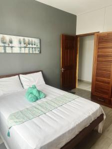 Postel nebo postele na pokoji v ubytování Casa Elegante