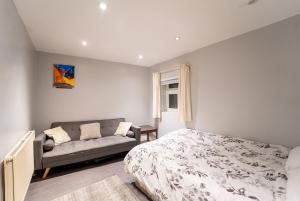 Ένα ή περισσότερα κρεβάτια σε δωμάτιο στο 2 Bedroom entire Flat New Cross london