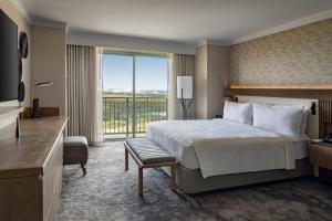 Postel nebo postele na pokoji v ubytování JW Marriott Orlando Grande Lakes