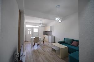 Телевизор и/или развлекательный центр в Le Nina Apartments-Deluxe and Studio